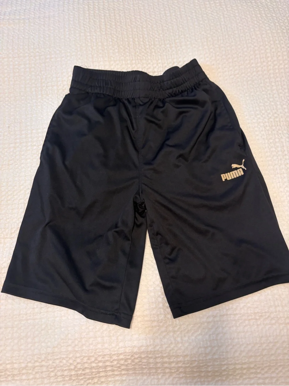 Puma Boys Black Athletic Shorts with Gold Logo